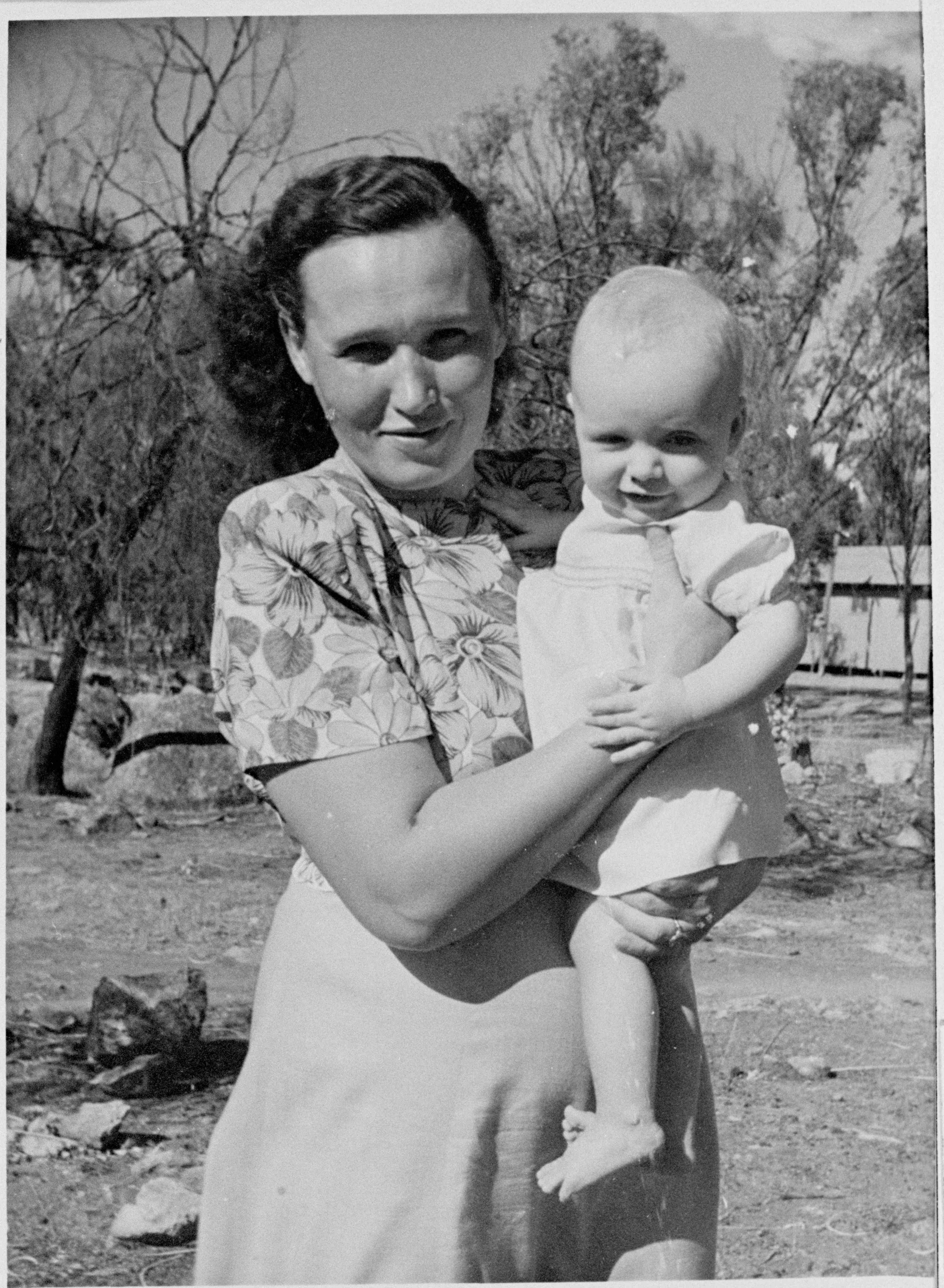 Photo of woman holding baby