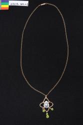 gold, blister pearl & peridot, Caris Bros; Circa 1900- 1910